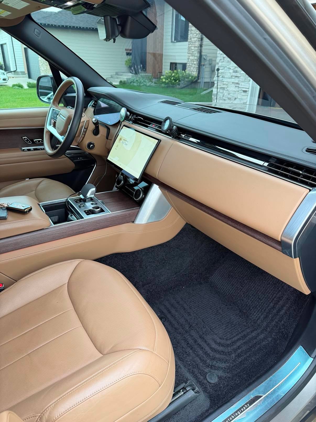 Cleaned front dashboard and tan leather interior